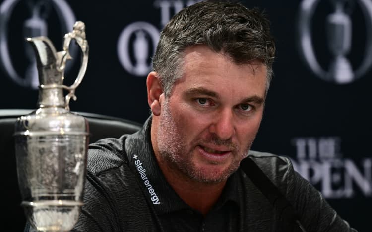 New Zealand's Ryan Fox speaks as he holds a press conference beside the Claret Jug after winning the Open Golf championship at Royal Birkdale, England, July 19, 2026. (Photo by Ben STANSALL / AFP) / RESTRICTED TO EDITORIAL USE