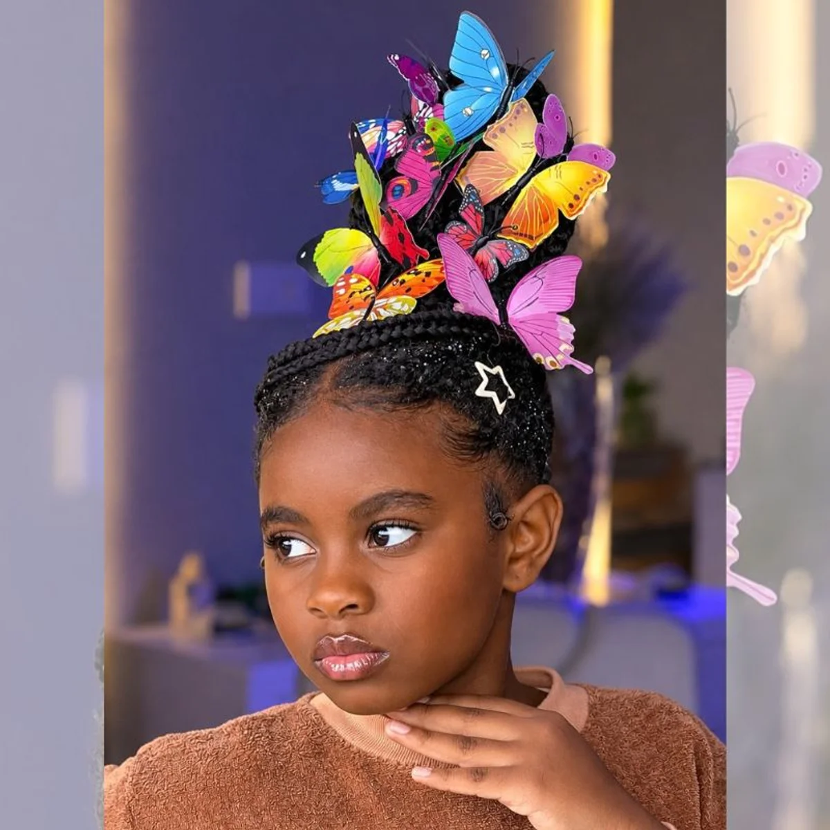 Mãe capricha e faz surpreendente penteado com borboletas na filha